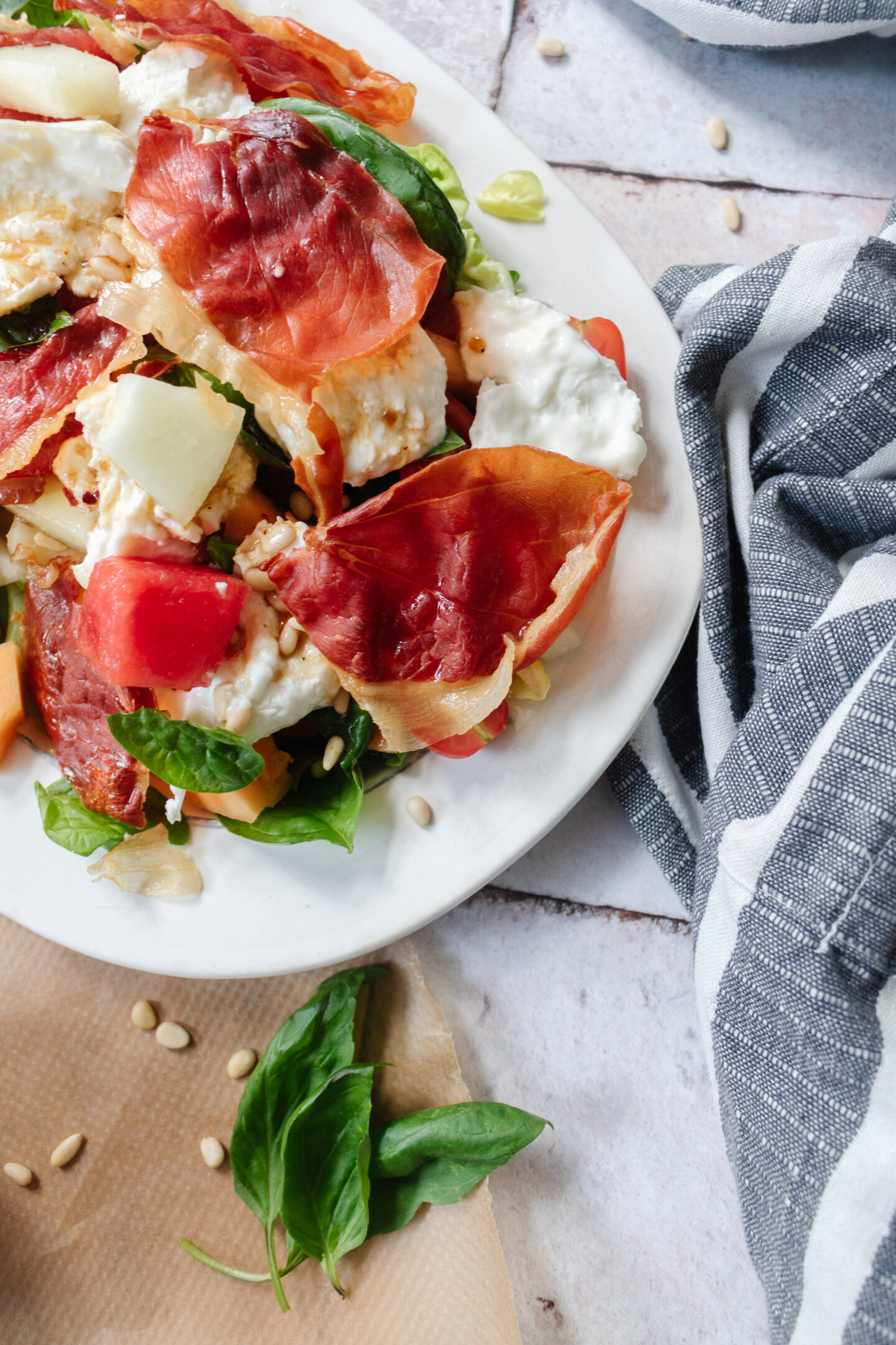 an edited lifestyle recipes melon, burrata and prosciutto salad