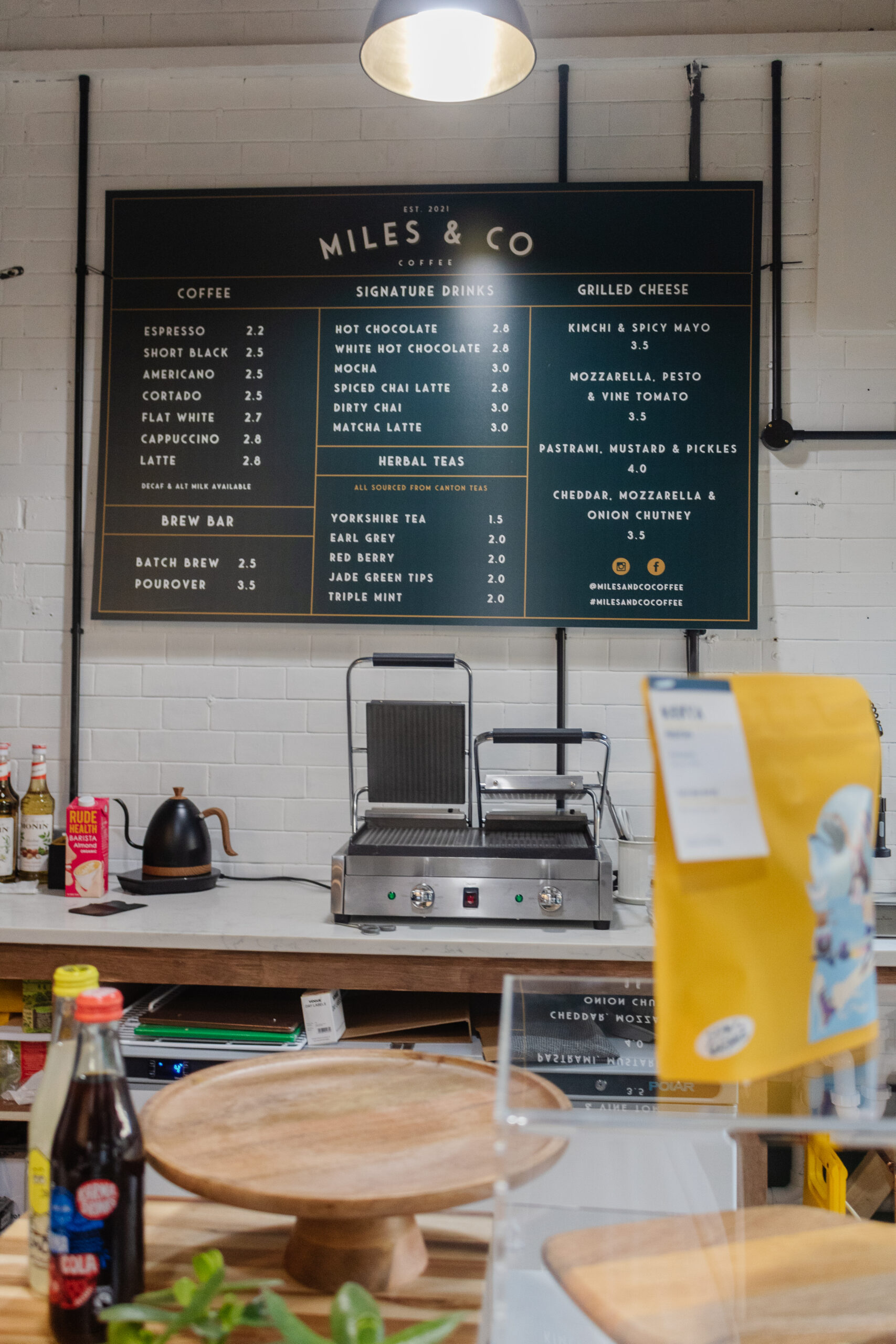 an edited lifestyle miles & co coffee shop opening