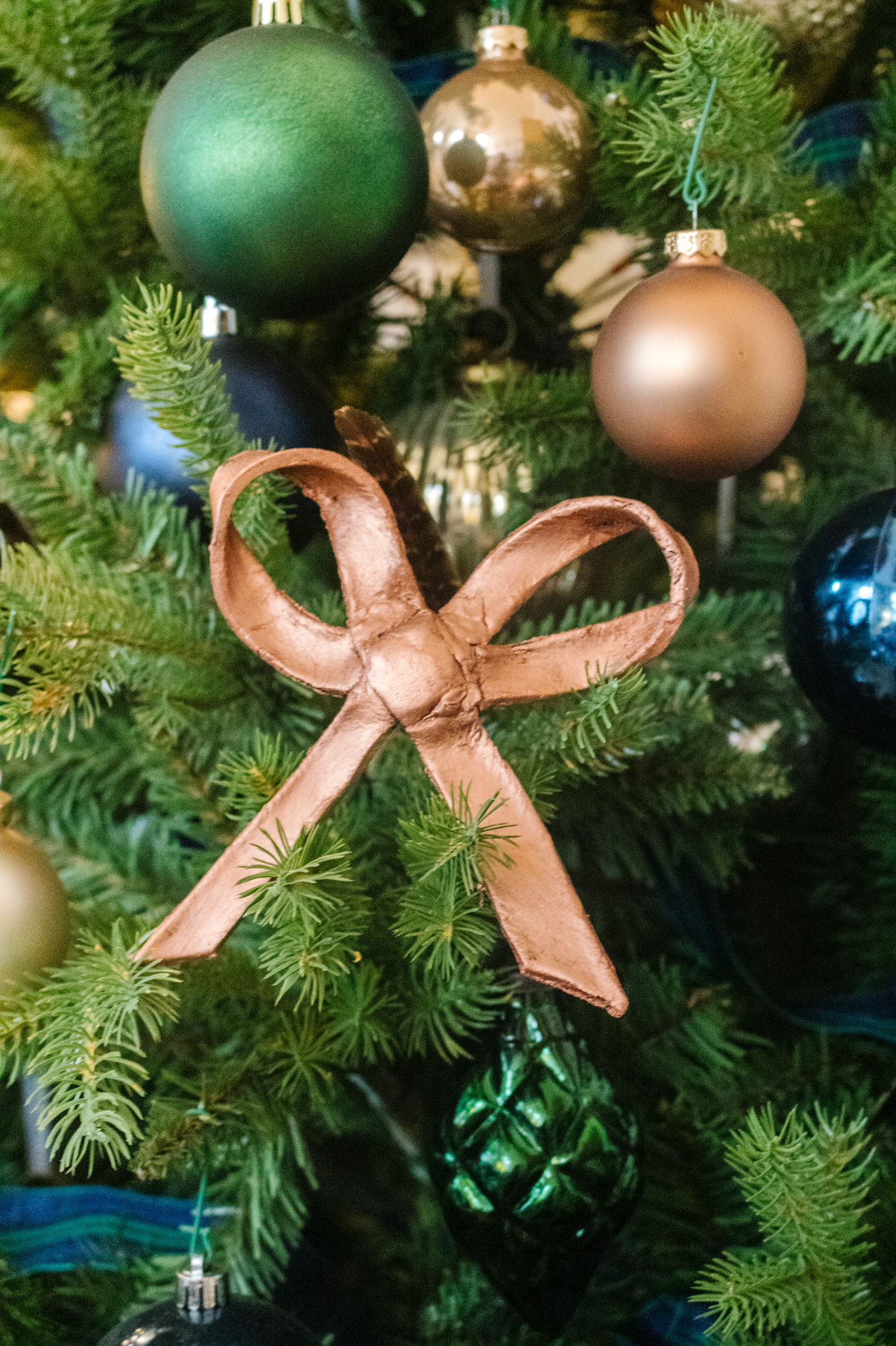 an edited lifestyle diy McGee and co brass bow tree ornaments